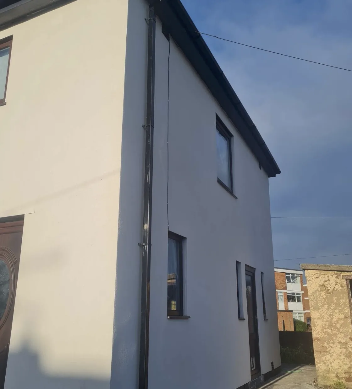 Finished render on the side of a house