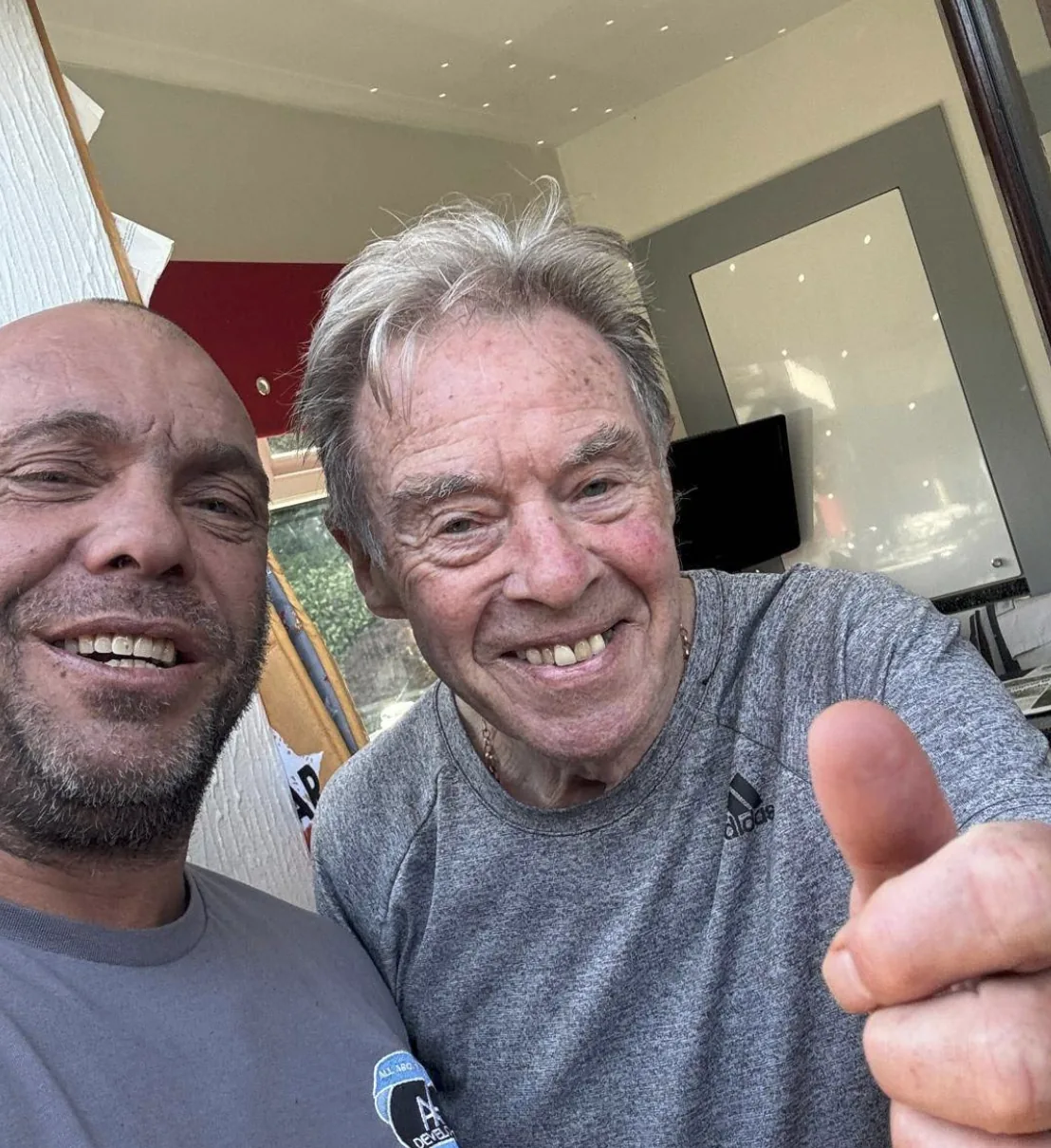 AAA team member pictured with a customer indoors