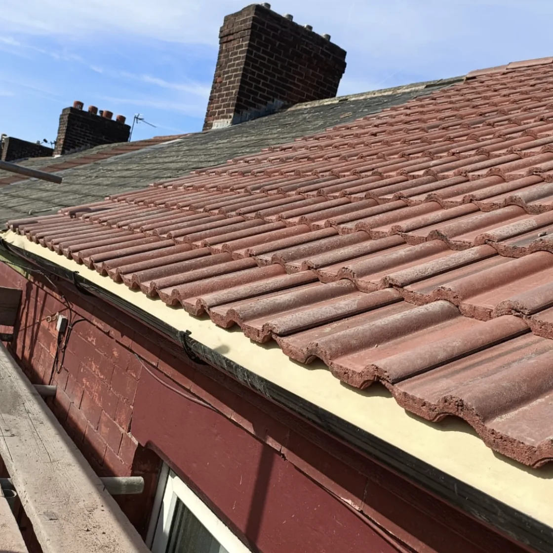 Red tiled roof on a terraced house